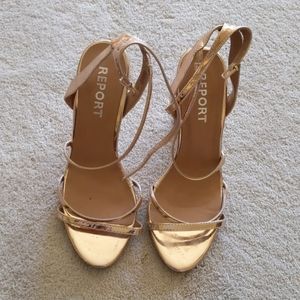 report gold heels